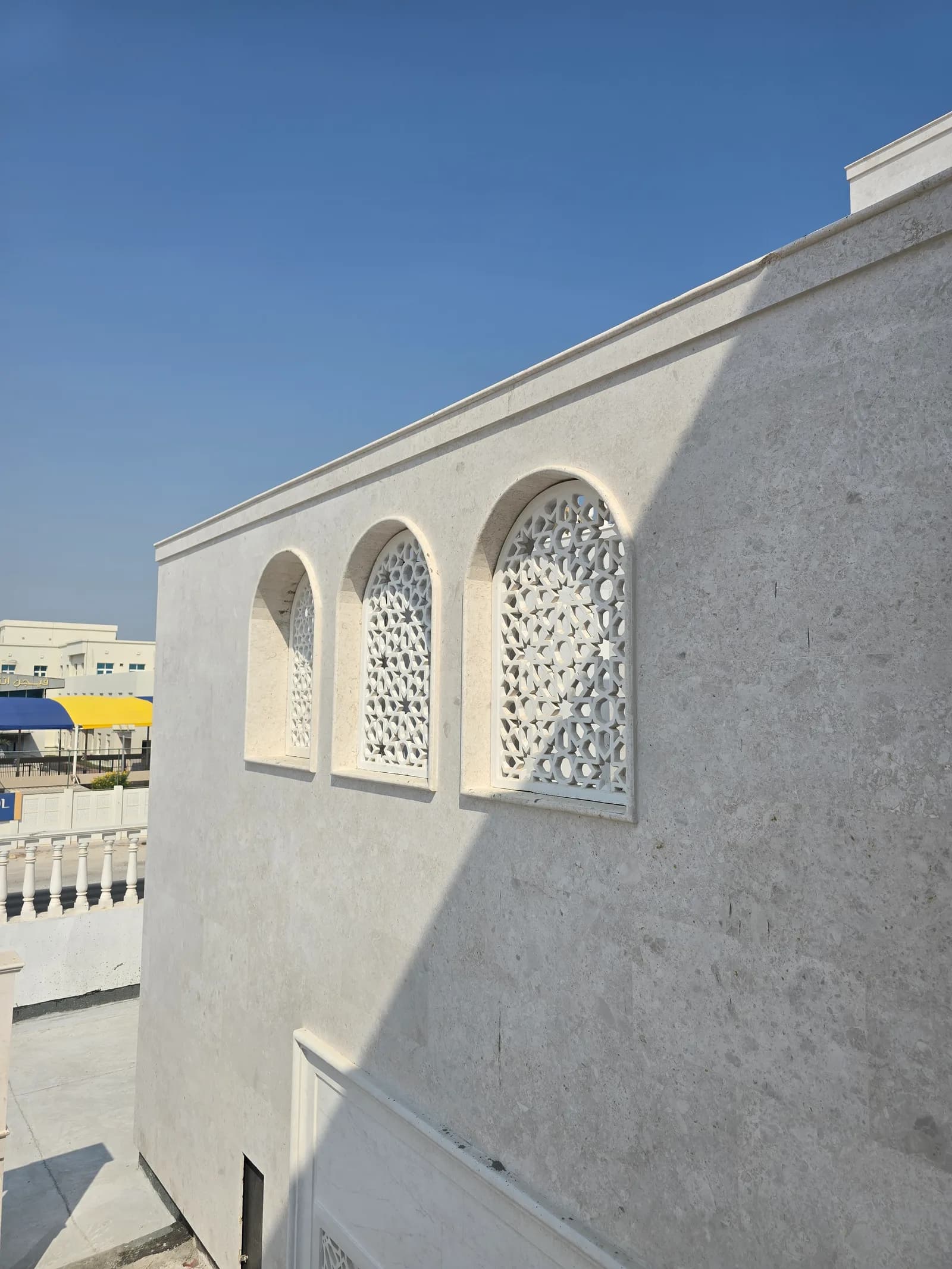 Mashrabiya arched windows — Al Wakrah, Qatar